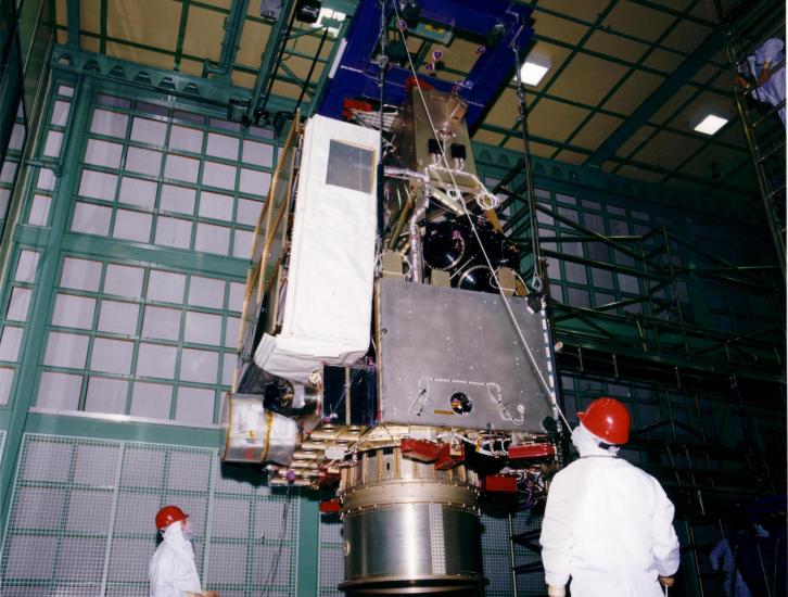 Engineers at Goddard Space Flight Center constructing the TRMM satellite assembl