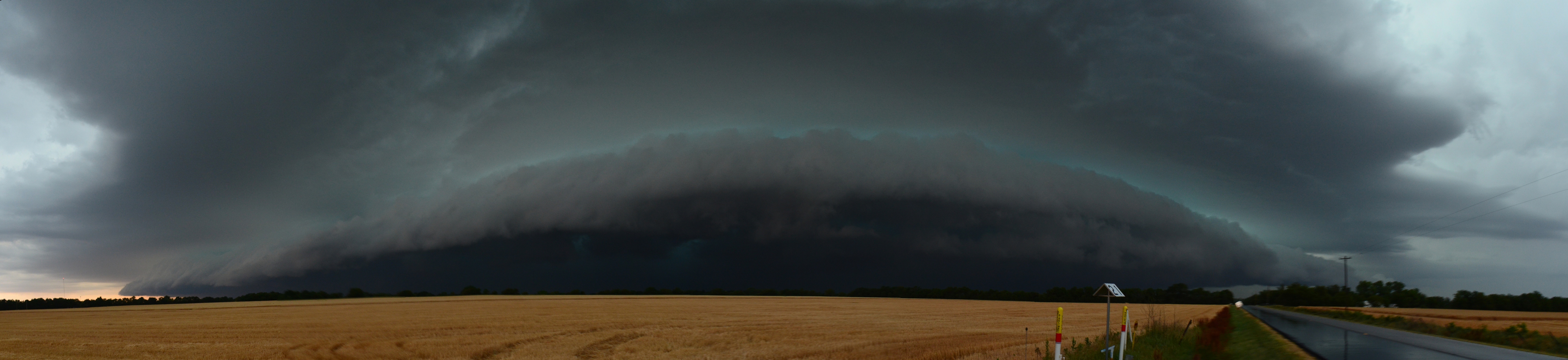 Huge panoramic view of an approaching storm.