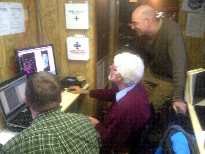 Scientists at GCPEx looking at a radar screen
